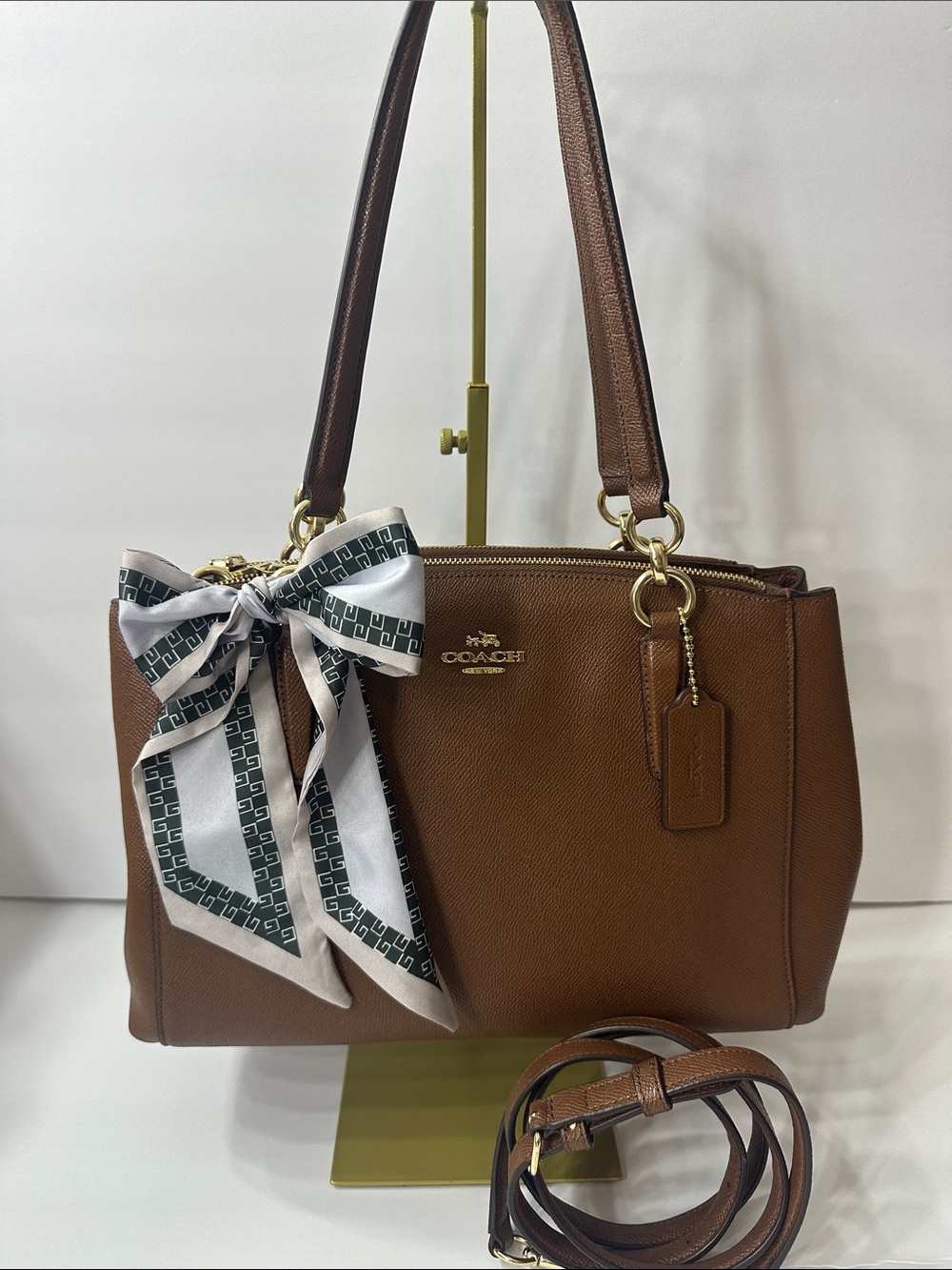 Coach Christie Carryall in brown leather.
